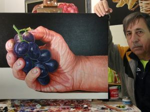 The detail in this painting is incredible: Hand of Alfredo Passante with a bunch of grapes