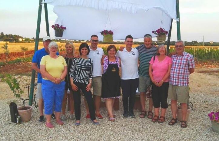 Group photo with vineyard owners, guests and Puglian Pleasures